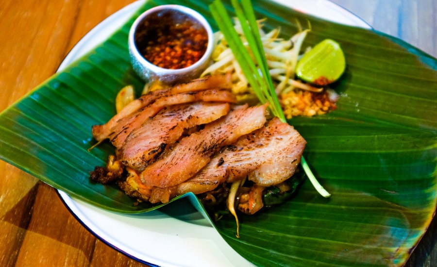 Pad Thai Fai Ta Lu is served on the signature banana leaf for a hint of aroma