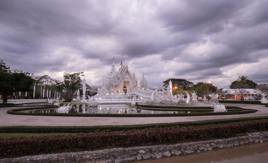 Chiang Rai’s White Temple in a cloudy afternoon, rainy season in Thailand