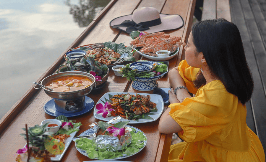 Enjoying Nakhon Pathom cuisines along the riverside is a must-try experience