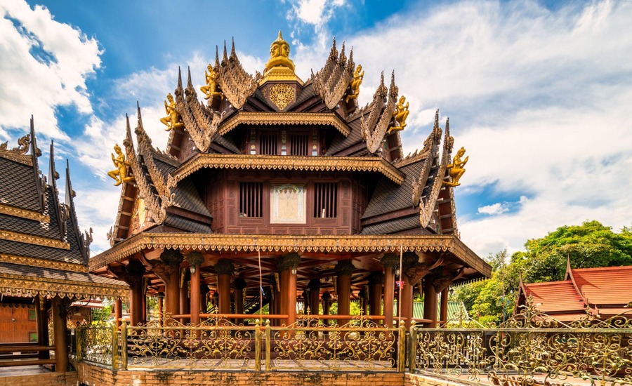 Meditation halls surrounded by greenery at Wat Sangkhathan